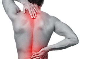 person holding back in pain